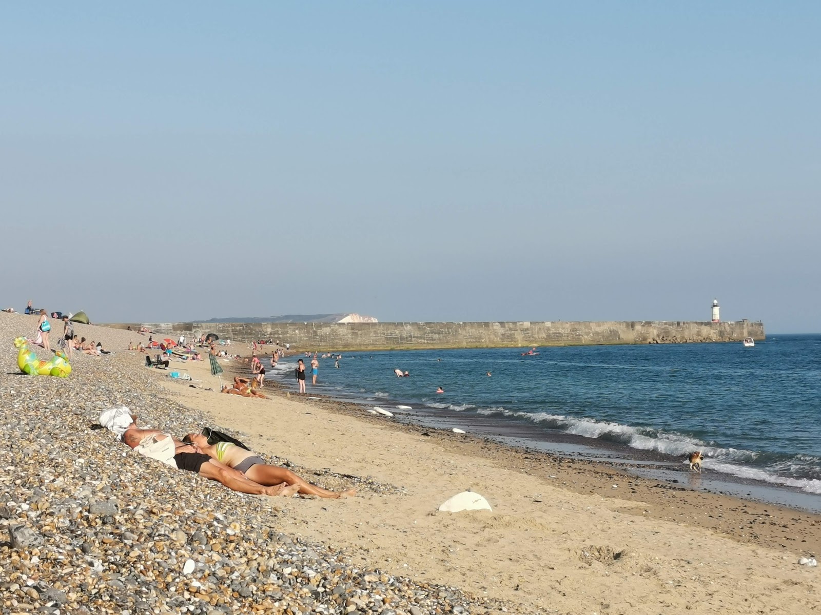 Fotografija Newhaven beach z prostoren zaliv