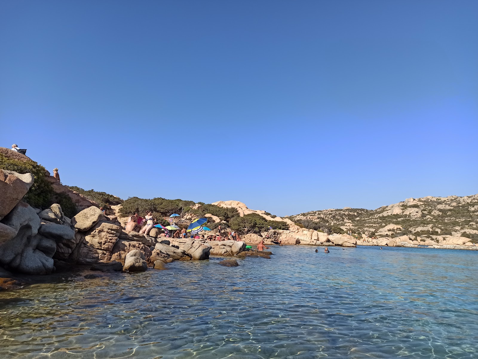 Photo of Cala Carlotto surrounded by mountains