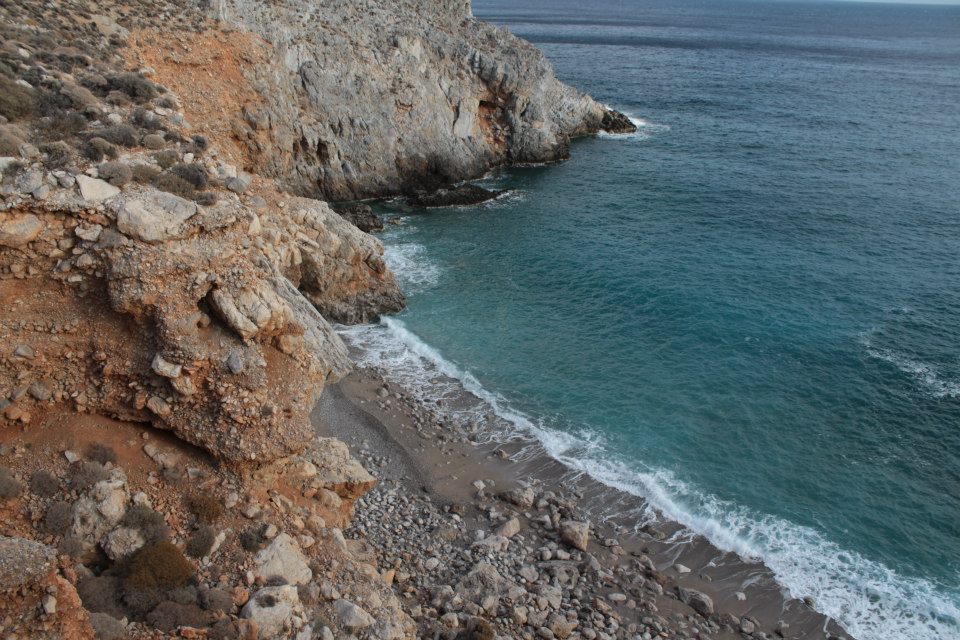 Valokuva Wall of Taichidaista. pinnalla kirkas hiekka ja kivet:n kanssa