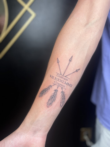 Explore cute neck tattoo ideas, creative tattoo ideas in Foley, available at Emerald Ink Tattoos by Victoria