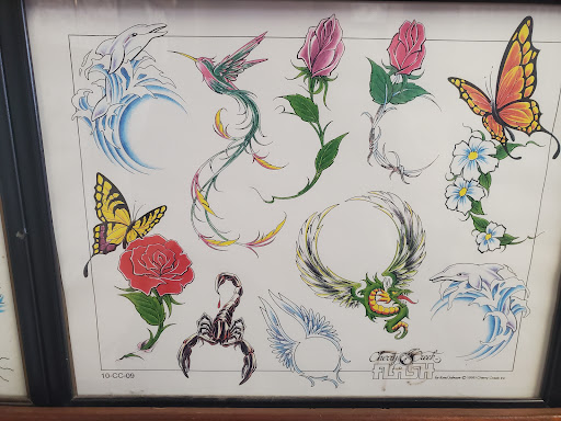 Explore black rose tattoo cover up ideas, creative tattoo ideas in Fort Worth, available at Randy Adams Tattoo Studio