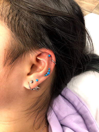 Explore garter tattoo ideas, creative tattoo ideas in Buford, available at Wild Tribe Tattoos and Piercings