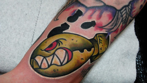 Explore eren yeager tattoo ideas, creative tattoo ideas in Peru, available at Inked Memories Tattoo Company