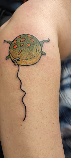 Explore genesis tattoo ideas, creative tattoo ideas in Owensboro, available at Lady Luck Tattoo and Body Piercing