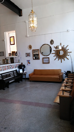 Explore trinidad tattoo ideas, creative tattoo ideas in Athens, available at 3 Ravens Tattoo & Piercing