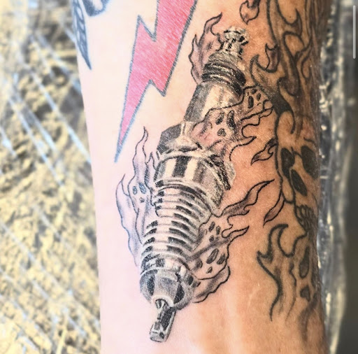 Explore killmonger tattoo ideas, creative tattoo ideas in Palm Harbor, available at Angry Owl Tattoo and Piercing