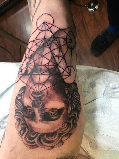 Explore chest piece tattoo ideas for men, creative tattoo ideas in Portland, available at Ritual Arts