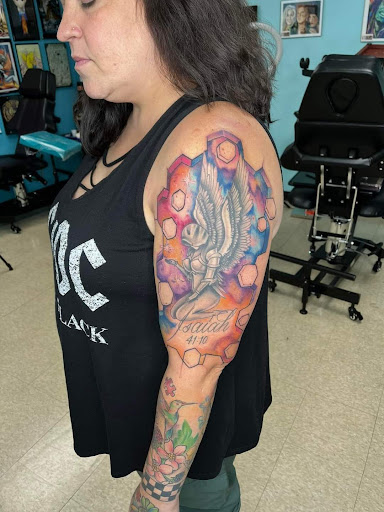 Explore unique hand tattoo ideas, creative tattoo ideas in Crystal City, available at Estro Ink