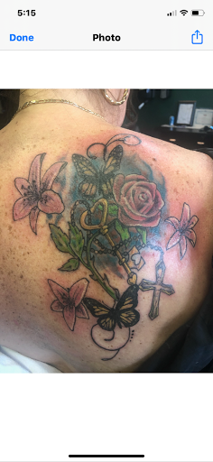 Explore new chapter tattoo ideas, creative tattoo ideas in Largo, available at Inside Ink Tattoo Studio