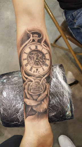 Explore dragon forearm tattoo ideas, creative tattoo ideas in Phoenix, available at Grand Avenue Tattoo & Piercings