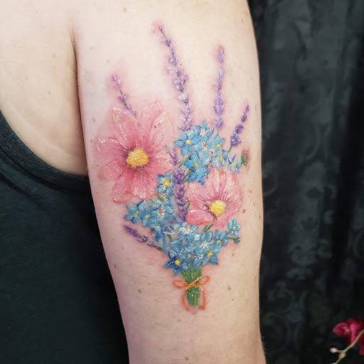 Explore jester tattoo ideas, creative tattoo ideas in Mebane, available at The Cardinal Skin Art & Gallery