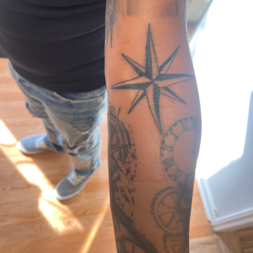 Explore guitarist tattoo ideas, creative tattoo ideas in Charlotte, available at BNI-Tattoos