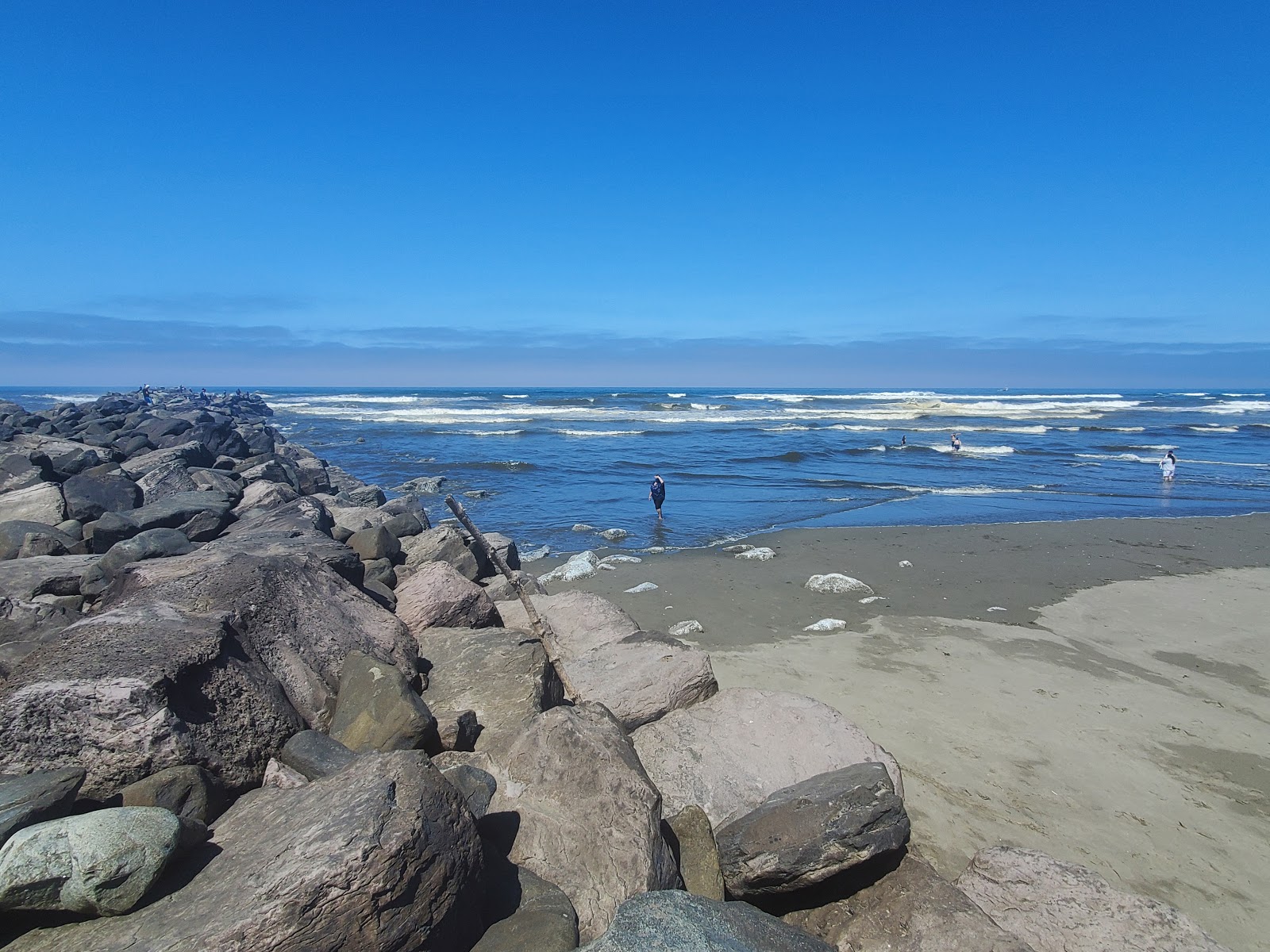 Foto von Ocean Shores Beach mit langer gerader strand