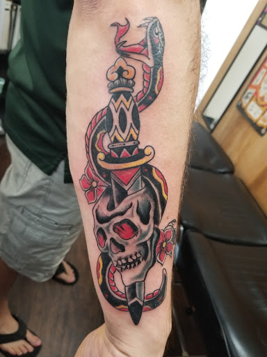 Explore mockingbird tattoo ideas, creative tattoo ideas in Frisco, available at Frisco Tattoo Company - Steel PaintBrush