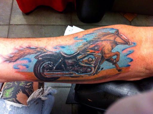 Explore rose idea tattoos, creative tattoo ideas in Cape Coral, available at The Tattoo Emporium