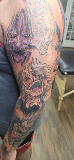 Explore flower back tattoo ideas, creative tattoo ideas in El Paso, available at Santa Rosa Tattoo Studio