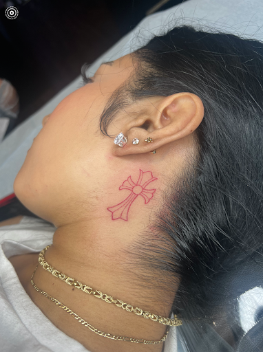 Explore rose tattoo ideas forearm, creative tattoo ideas in Los Angeles, available at Tattoo Love & Body Piercing Co.
