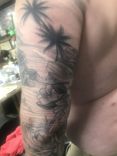 Explore leg tattoo ideas for men, creative tattoo ideas in San Marcos, available at Locally Famous Tattoo