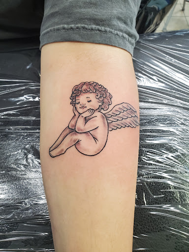 Explore leg tattoo cover up ideas, creative tattoo ideas in Rogers, available at Saved by Grace Tattoo Studio