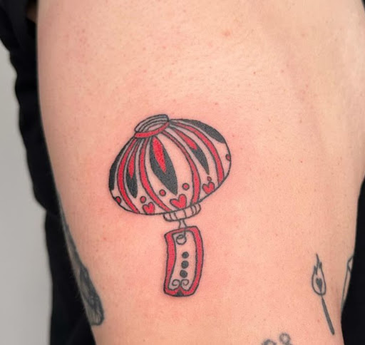 Explore matching cousin tattoo ideas, creative tattoo ideas in Brooklyn, available at Cake Is a Lie Tattoo Parlor