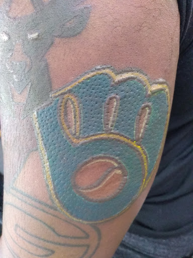 Explore clock hand tattoo ideas, creative tattoo ideas in Milwaukee, available at Bay Street Tattoo Co.