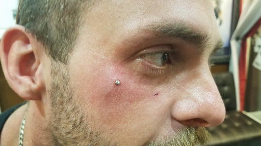 Explore under knee tattoo ideas, creative tattoo ideas in Myrtle Beach, available at Pitbull Tattoo and Piercing Clinic