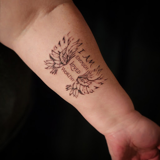 Explore color flower tattoo ideas, creative tattoo ideas in Minocqua, available at Whisky Rose Tattoo Parlor