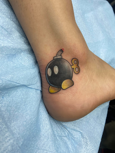 Explore music tattoo ideas men, creative tattoo ideas in El Paso, available at American Tattoo Society of Ft Bliss
