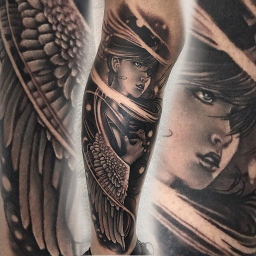 Tattoo Shop «The Divine Canvas Tattoos, Photography and Fine Art», reviews and photos, 1921 E Colonial Dr, Orlando, FL 32803, USA