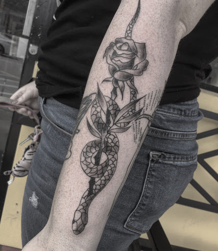 Explore rose foot tattoo ideas, creative tattoo ideas in Atlanta, available at Big Cat Tattoo
