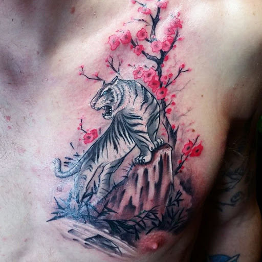 Find tattoo ideas chest for your next unique tattoo in Lewisburg at Acacia Tattoo Co.