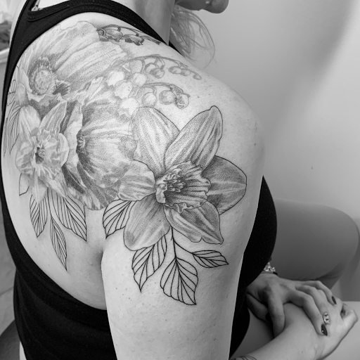 Explore tattoo ideas for collarbone, creative tattoo ideas in Springboro, available at Ink by Erin Ironside Tattoo Studio