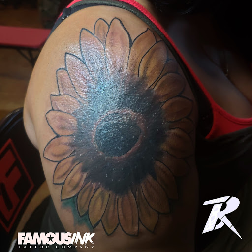 Explore snake sleeve tattoo ideas, creative tattoo ideas in Hammond, available at Famous Ink, Inc.