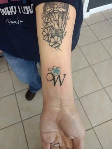 Explore tattoo cross ideas for men, creative tattoo ideas in Milan, available at Apocalyptic Ink Studio