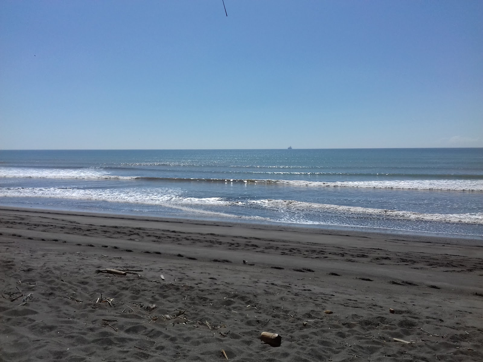Foto de Playa De Los Olivos con recta y larga