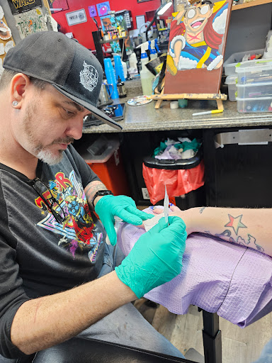 Explore girl sleeve tattoo ideas, creative tattoo ideas in Largo, available at Alchemy Tattoos and Body Piercings