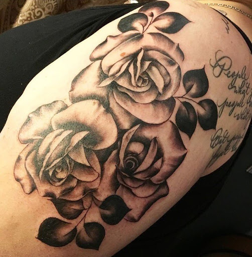 Explore apple tattoo ideas, creative tattoo ideas in San Diego, available at Sideshow Tattoo and Piercing