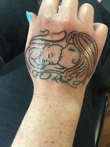Find best wrist tattoo ideas for your next unique tattoo in Elk River at Subjective Art Tattoo, LLC