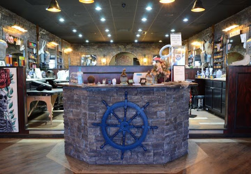 Explore vertical tattoo ideas, creative tattoo ideas in Oak Grove, available at Hell or High Water Tattoo Shop