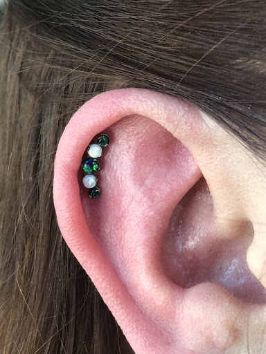 Explore peck tattoo ideas, creative tattoo ideas in Bloomington, available at Evil by the Needle Custom Tattoo and Piercing Studio