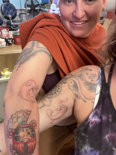 Explore flower back tattoo ideas, creative tattoo ideas in Crystal River, available at Americas Best Tattoos