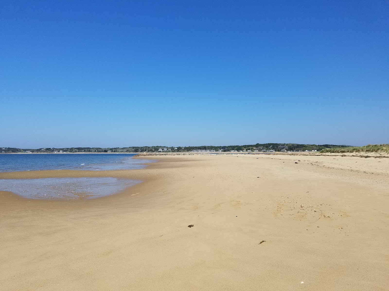 Zdjęcie Indian Neck beach z powierzchnią beżowy piasek