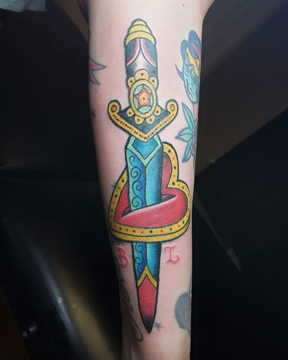Explore globe tattoo ideas, creative tattoo ideas in Albany, available at Purgatory Tattoo Co.