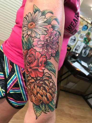 Explore ford tattoo ideas, creative tattoo ideas in Rochester, available at Sacred Heart Studios