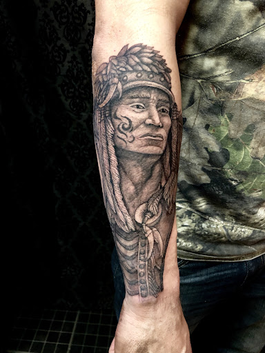 Explore iron man tattoo ideas, creative tattoo ideas in Anniston, available at Infinity Ink