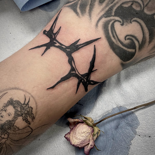 Explore anime hand tattoo ideas, creative tattoo ideas in Buffalo, available at True Gloom Tattoo Studio