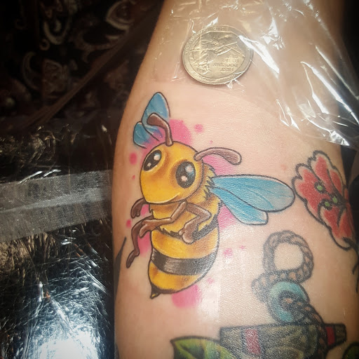 Explore safety pin tattoo ideas, creative tattoo ideas in Titusville, available at Exclusive Ink Studio