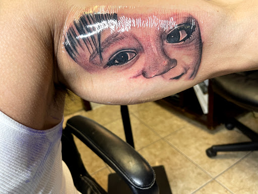 Explore animal skull tattoo ideas, creative tattoo ideas in Atlanta, available at Gold Fish Tattoo And Body Piercing