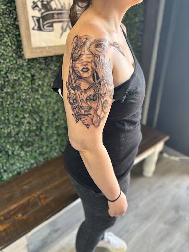 Explore tattoo ideas with your child's name, creative tattoo ideas in Chattanooga, available at Southern Soul Tattoo & Piercing Studio