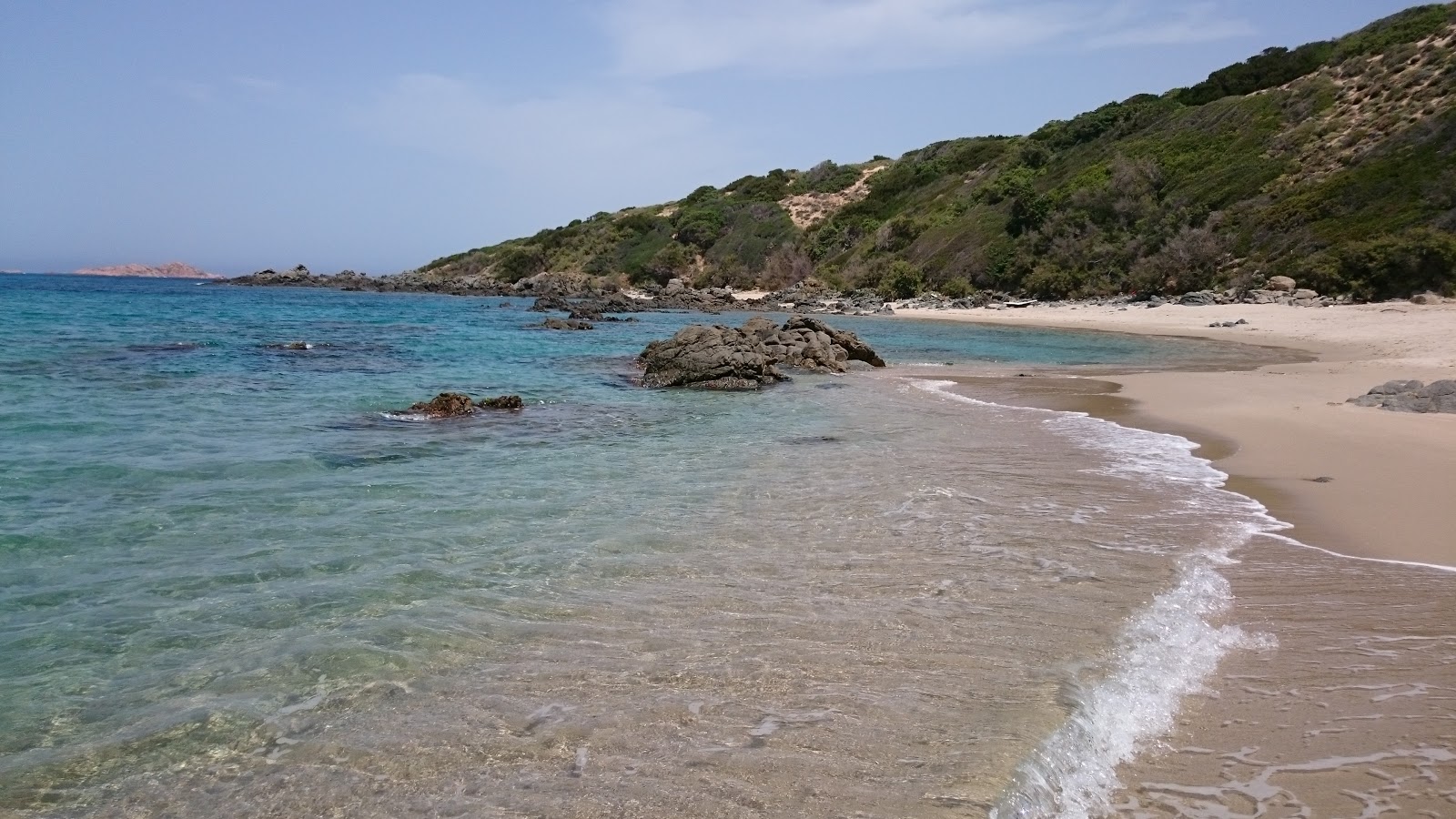 Foto van Spiaggja di Li Ferruli voorzieningenruimte